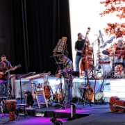 Jeanne Anne on drums and harmonica, Michael on bass, Rob on dobro,  and Eric –on guitar and harmonica.   (photo by Danl Blackwood)