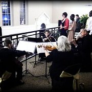 The Sandquist Family Quartet played "Home On The Range" to close out the evening. One of my old high school buddies David Metzenthin's sister Carolyn, her husband Art and their two sons, Peter and Patrick are the players.