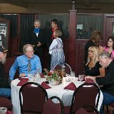 Karry Livgren and Greg Allen (original member of the band &#34;White Clover&#34;); Two members of the band &#34;Prairie Rose Rangers&#34; visit with Kerry&#39;s wife Vicci (standing at back center); Rich and Debby Williams (seated at table on right); Great Overland Station President Bette Allen talking with Deb Bisel (standing at back right).